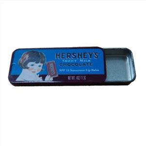 החלק את קופסת הפח מכסה